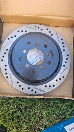 Corvette C5 front rotors drilled out 5x100 for the Pontiac Fiero