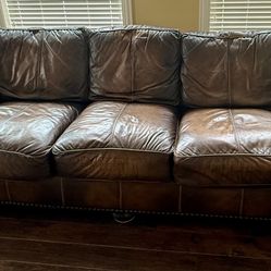 Stylish Brown Leather Couch featuring plush new memory foam