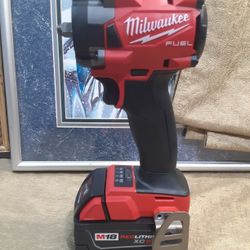 NEW MILWAUKEE M18 FUEL 3/8 IMPACT WRENCH AND BATTERY 5.0