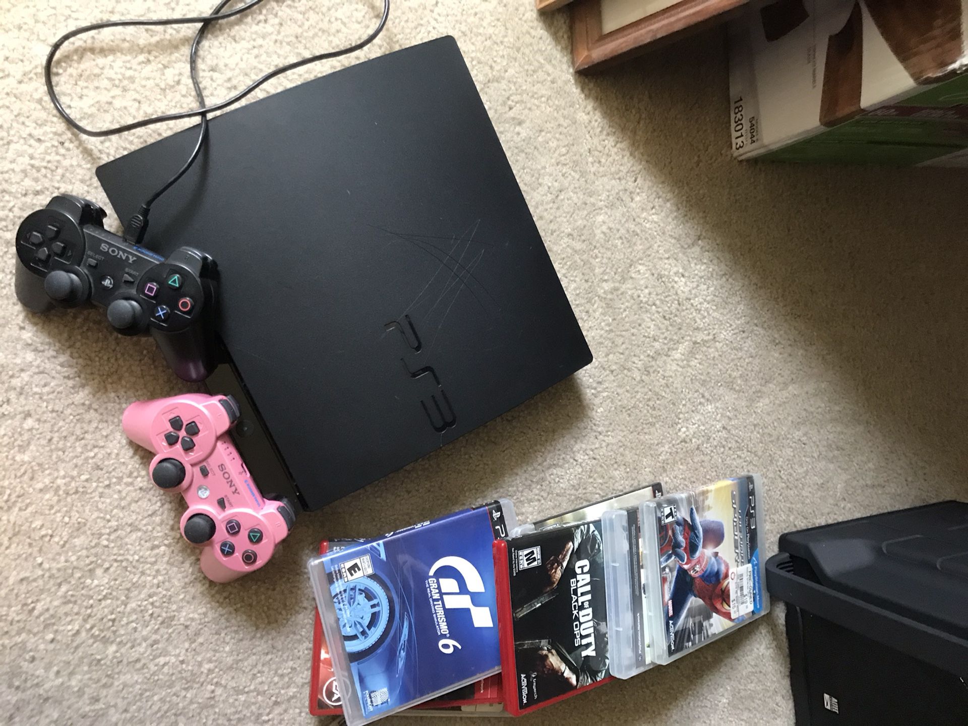 PS3 with 2 controllers and multiple games