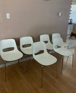 6 STACKABLE RESISTANT CHAIRS $30.00 EACH ONE OR $150.00 FOR ALL THEM)
