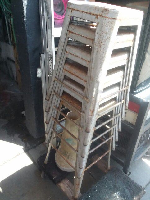 6 Metal Bar Stools.  5 Small One Big.  100 For.all