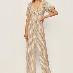 Beautiful printed jumpsuit, size L, brand new – never worn.
