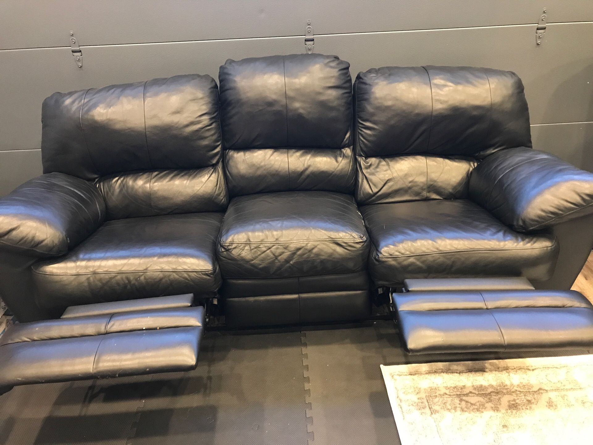 Black Sofa, the two ends are electric recliners, which work, in very good condition, $30