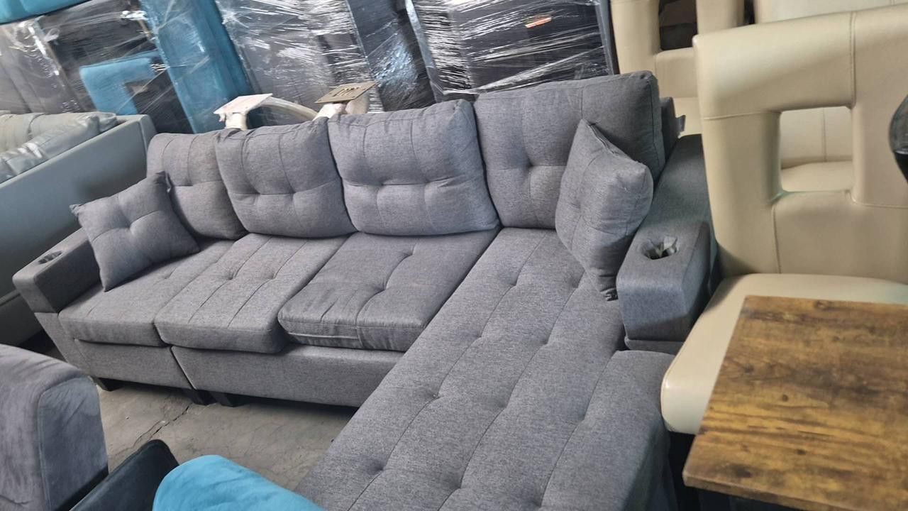 BRAND NEW SECTIONAL COUCH WITH CUP HOLDERS