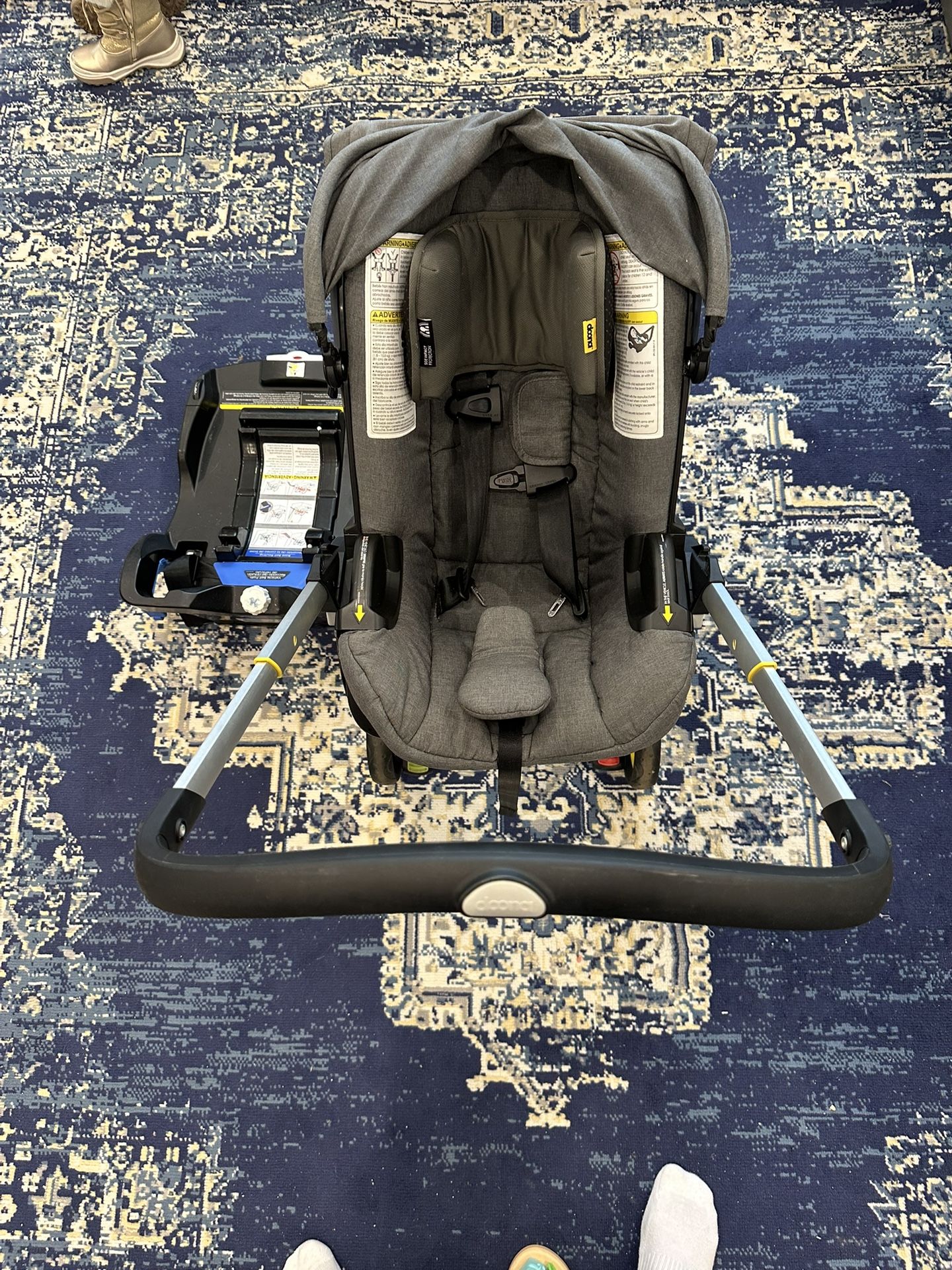 Like New Doona stroller With Base.