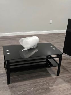 free moveable black glass table - pick up only