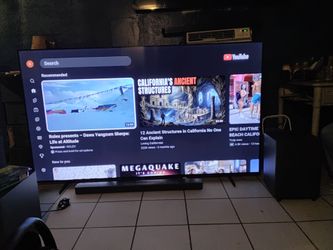 85" crystal UHD TV with soundbar and subwoofer