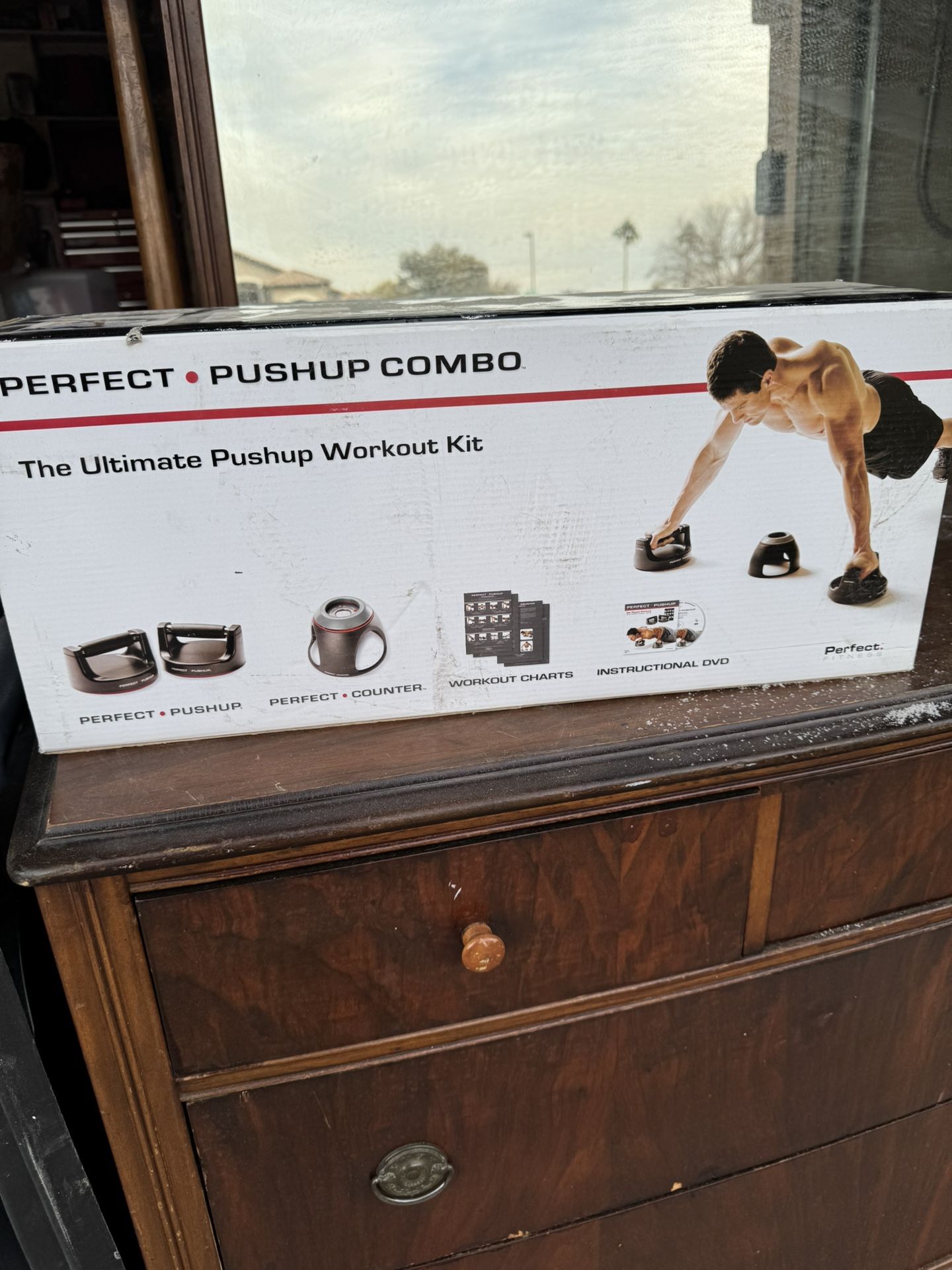 New perfect push-up combo, fitness handles, fitness counter, workout charts, and instructional DVD. It has never been . In garage and never used! Cro