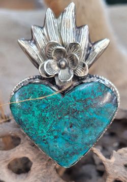Flaming heart lady's silver ring