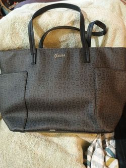 Description
Black Guess Tote with tassel. Gently used.