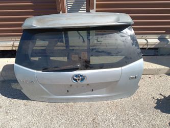 2012-2018 Toyota Prius V tailgate with accessories OEM.