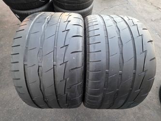 2 USED TIRES FIRESTONE 305/35/20