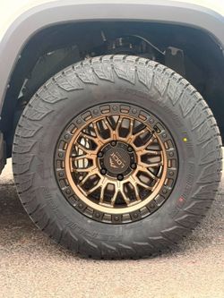 17x9 Combat Lock Off-road Rims And Tires 285/70/17 RBP AT