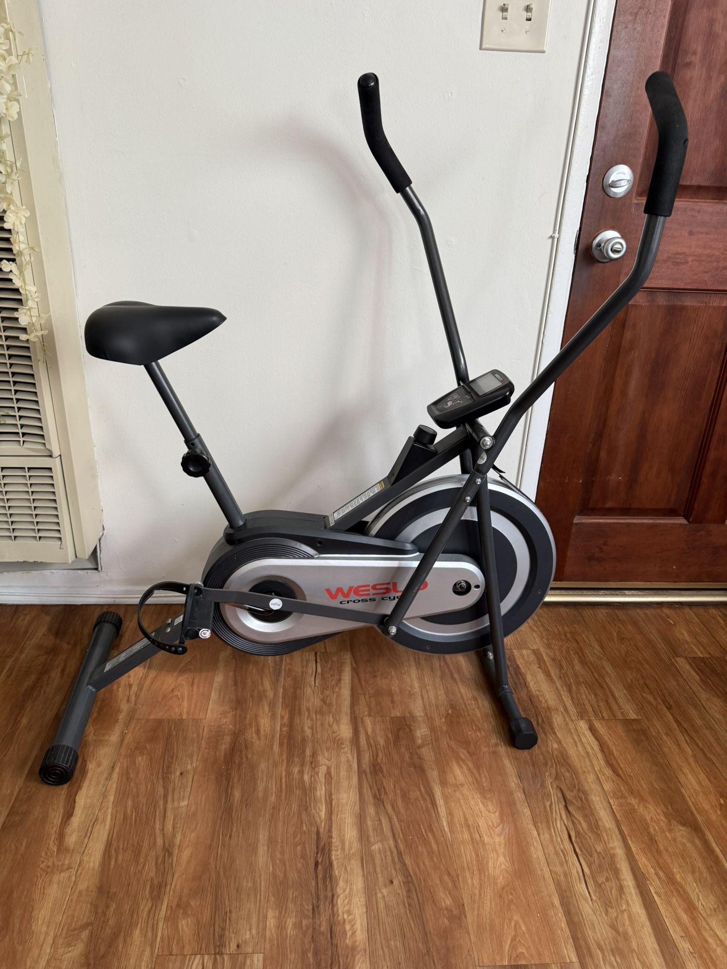 Weslo Cross Cycle Upright Exercise Bike with Inertia-Enhanced Flywheel, 250 Lb. Weight Limit
