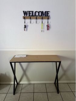 Welcome sign and entrance table