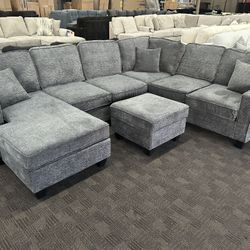 Comfy Charcoal Gray Sectional And Ottoman 