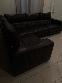 Brown leather reclining sectional