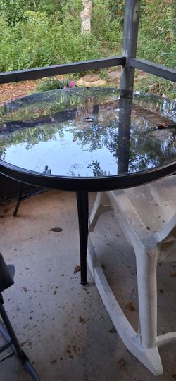Patio glass top table.