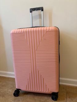 Brand new 28 inch pink luggage