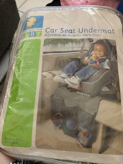 Car seat under mat NEW
