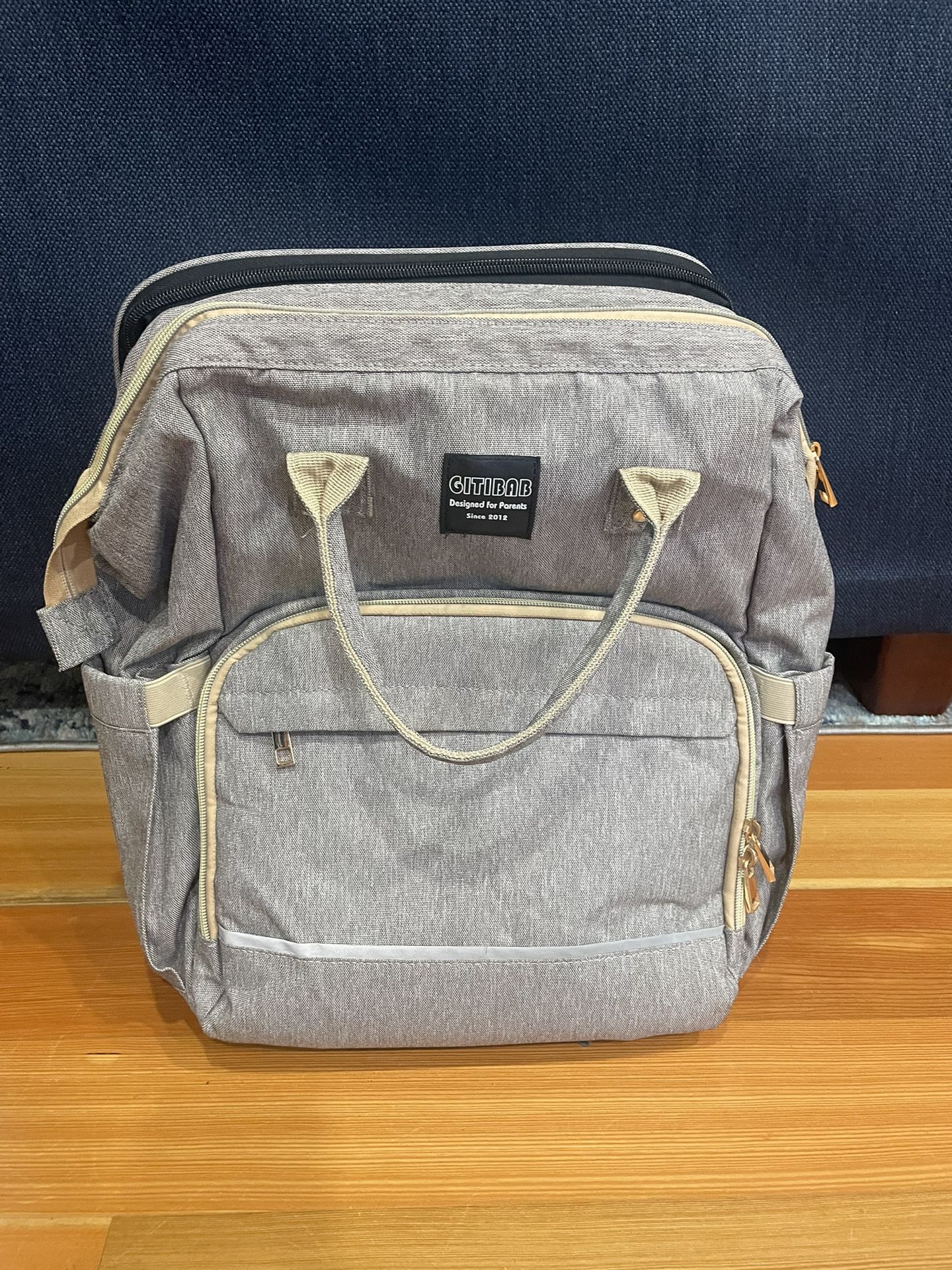 Diaper Backpack With Expandable Changing Station