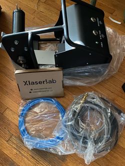 This device is a wire feeder unit, specifically the companion external wire feeder for the Xlaserlab X1 Pro Laser Welder. It controls the mechanized d