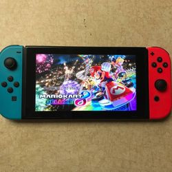 NINTENDO SWITCH with 50 POPULAR SWITCH GAMES and 7000 CLASSIC GAMES