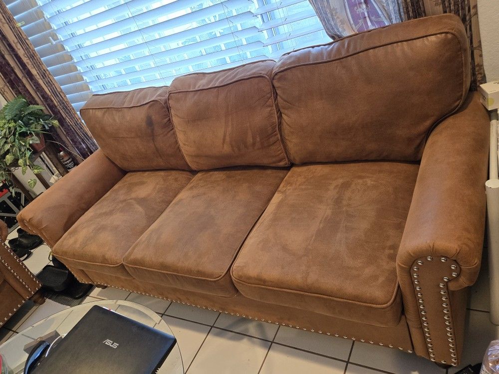 Excellent condition 2 pieces comfortable stylish Faux leather living room set: sofa and loveseat