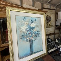 Framed floral artwork