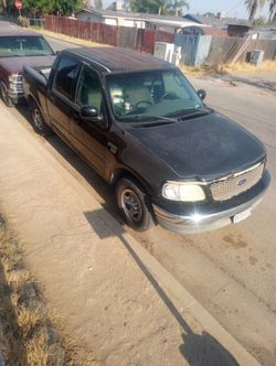 2003 f150 crew cab 171.000 miles daily driver ac heater radio power everything tags good until December 26