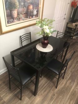Black Glass dining table set with 4 leather chairs