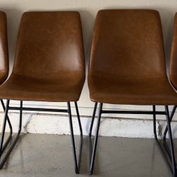 Set Of Leather And Metal Chairs