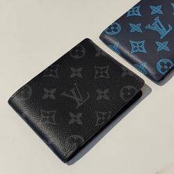 Two Louis Vuitton Wallets 