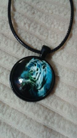 Tiger pendant, leather necklace