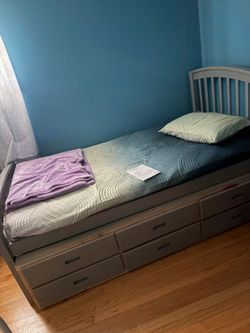 Twin bed with drawer