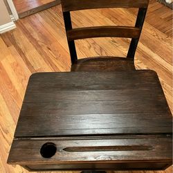 Antique  classroom  child's desk. Wood with ink well. Good condition  for its age