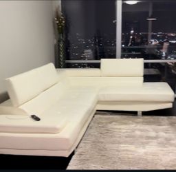 White sectional faux leather
