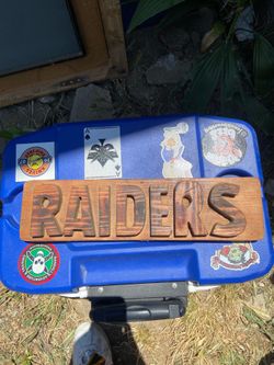 Raiders wooden sign
