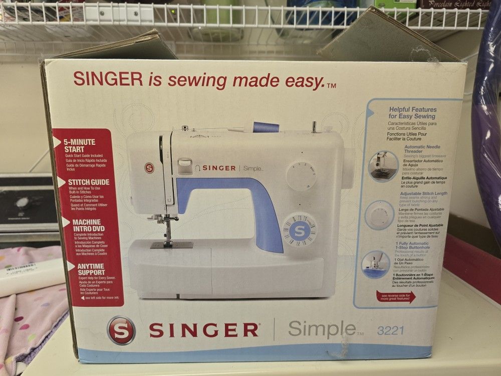 Singer Sewing Machine- Never Used.