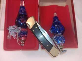 2 Lenox color sapphire ornaments.