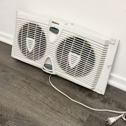 Holmes HAWF2030 Dual Blade Twin Window Fan •Adjustable thermostat •7" fan blades • 2 Speed • Slim design to fit into windows •Adjustable extender scre