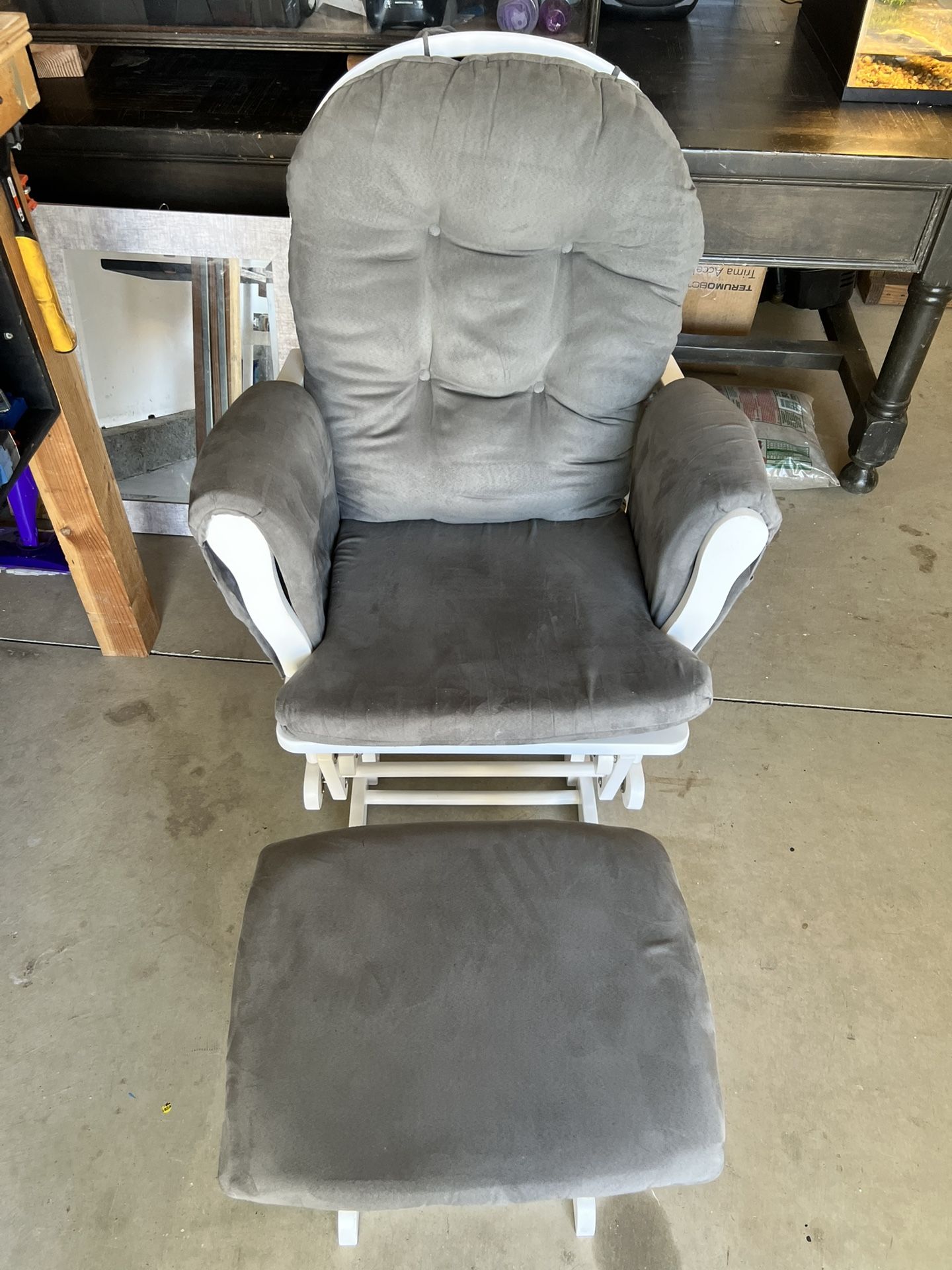 Sliding Rocking Chair With Sliding Door Rest.