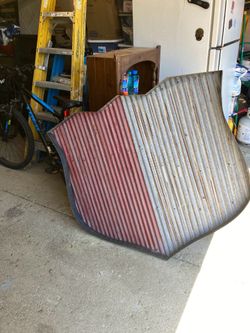 Metal wall hanging shield