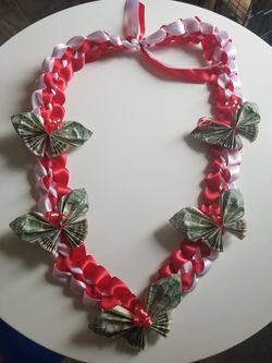 Ribbon lei with cash butterfly accents for graduation