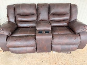 FREE  Brown Leather Reclining Loveseat with Console