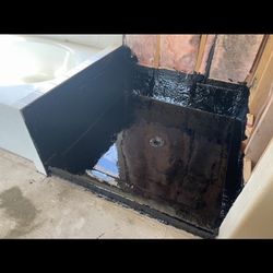 HOT MOPPING SHOWER PANS AND DECKS