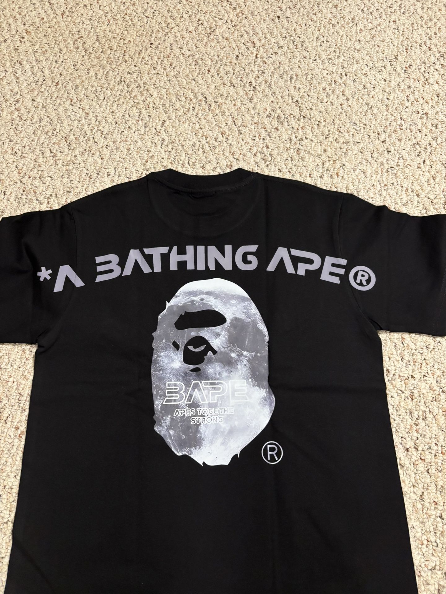 Never worn bape tee shirt double sided