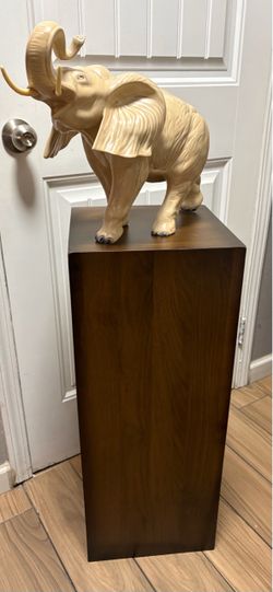 Elephant and pedestal