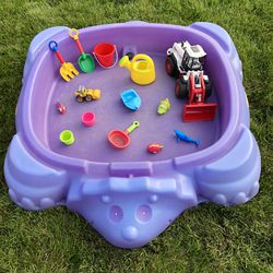 Sandbox with toys 
